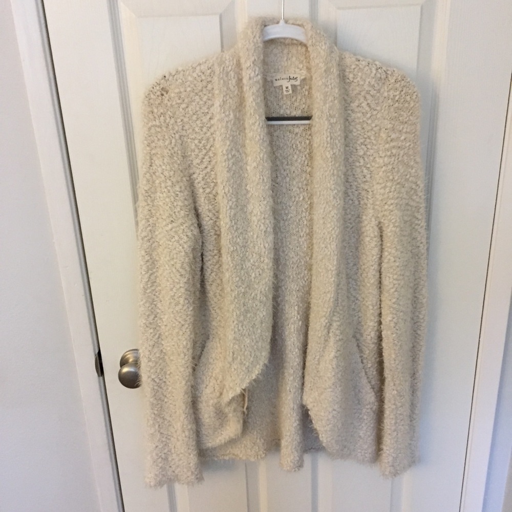 cream colored furry cardigan